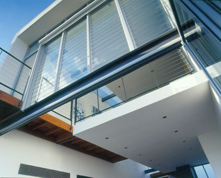 Modern architect designed house with glass louvred windows, bi-fold doors, mezzanine level