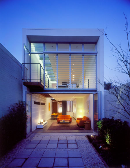 Modern architect designed house with louvred glass windows, bi-fold doors, lookout balcony