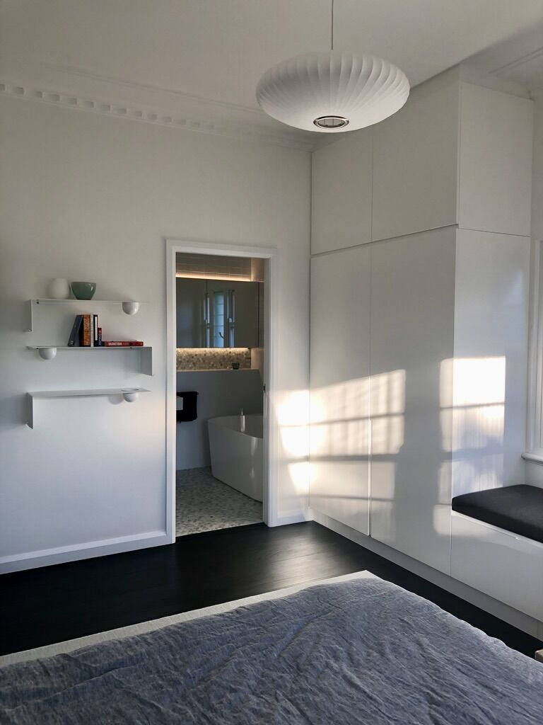 modern architect designed renovations white walls and joinery wiht white metal shelves