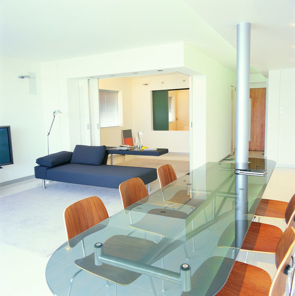 Modern architect designed apartment with custom glass table
