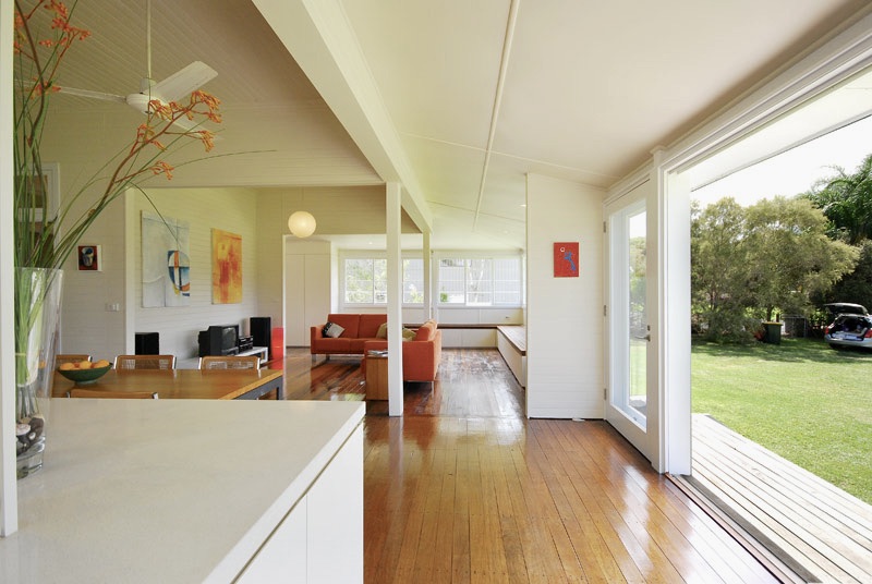 Architect designed renovations to queenslander home, open living area, sliding doors to outside