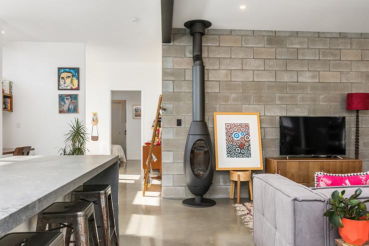 Modern architect desigend residence with concrete block wall with Oblica Ove wood combustion fireplace