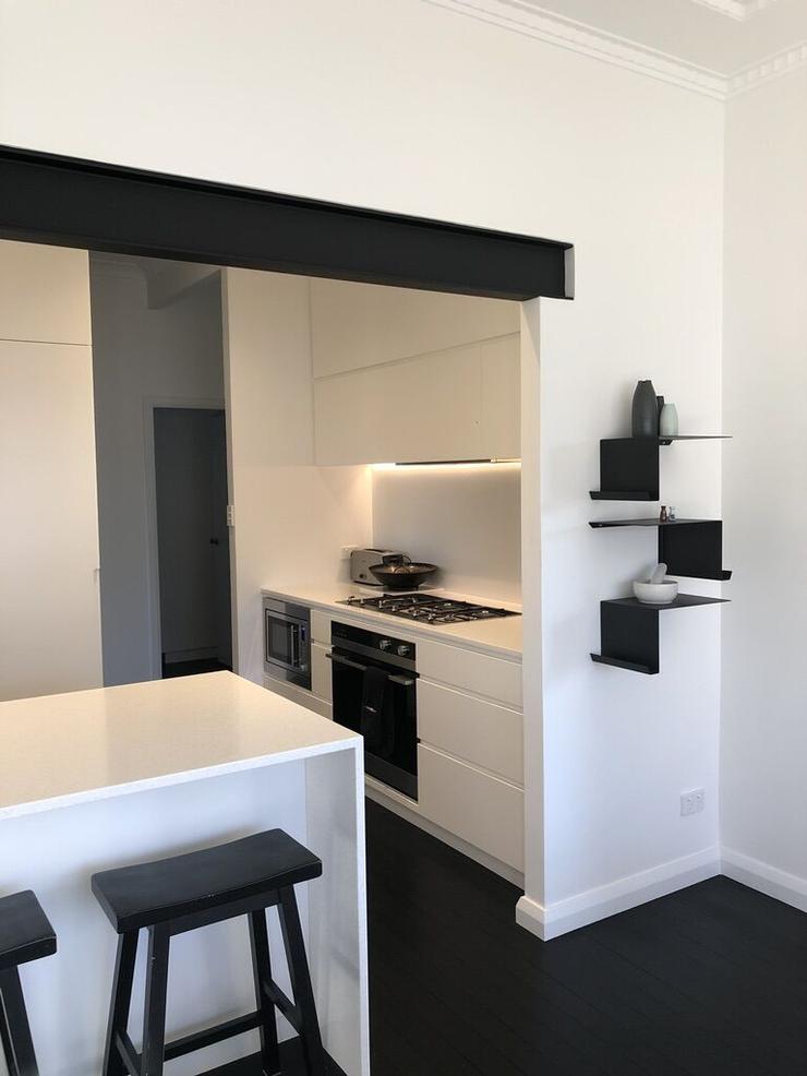contemporary architect designed black and white kitchen